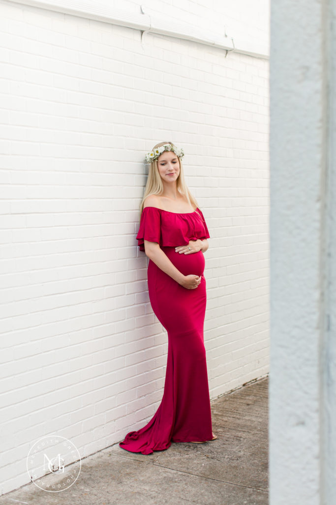maternity session with red gown