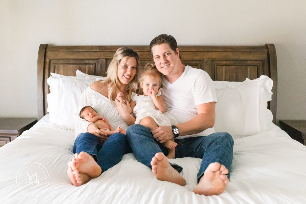 Newborn Lifestyle Session in master bedroom