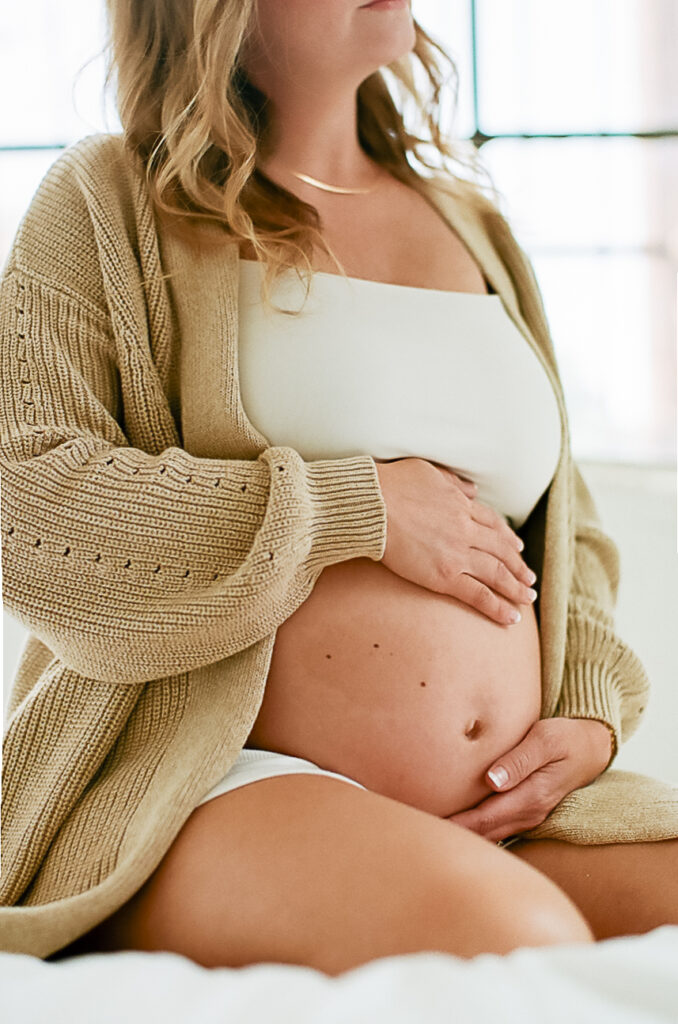 Mom posing at maternity session