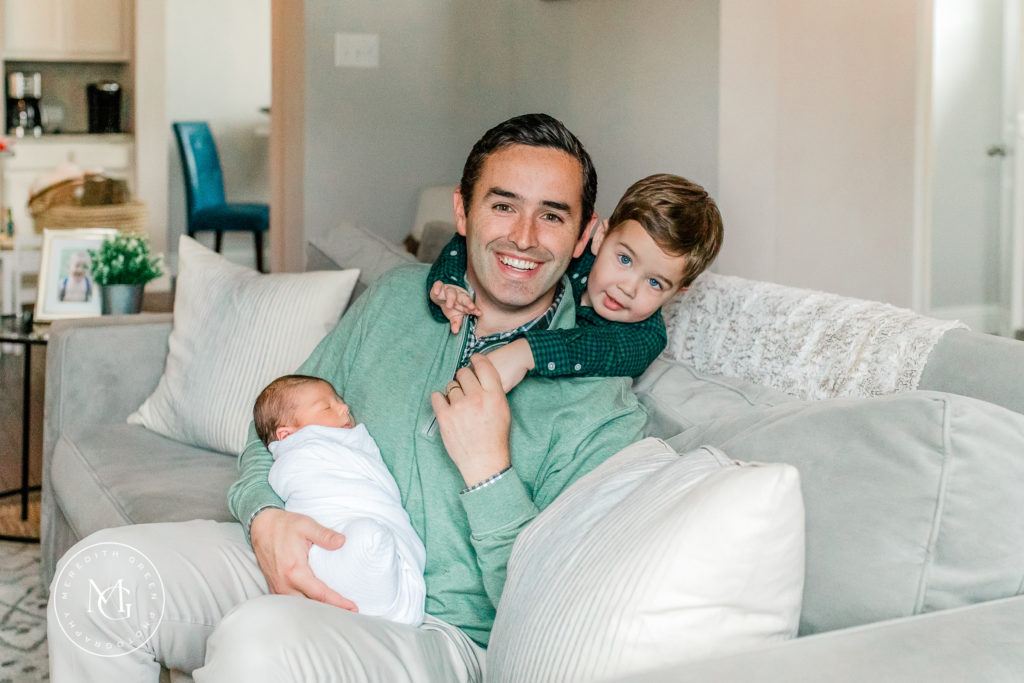 Father with his sons during newborn lifestyle session