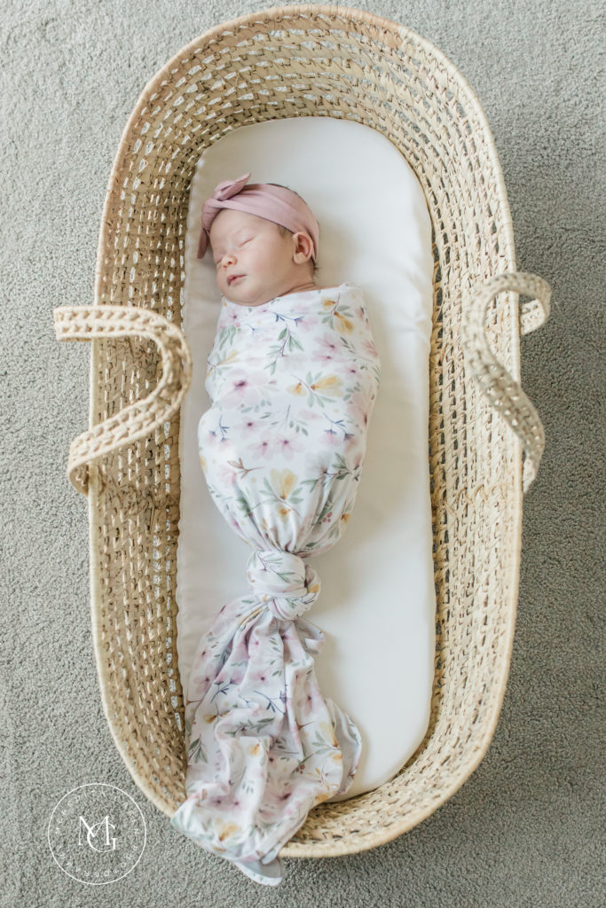 Newborn in Moses basket at in home newborn session